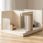 Minimalistisch architectuurkamer model op licht houten tafel met scheidingswand, schuifdeur en stoelen in zacht daglicht